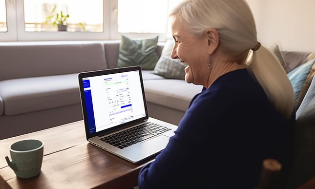 Senior woman on laptop shopping for Medicare insurance at Healthpilot