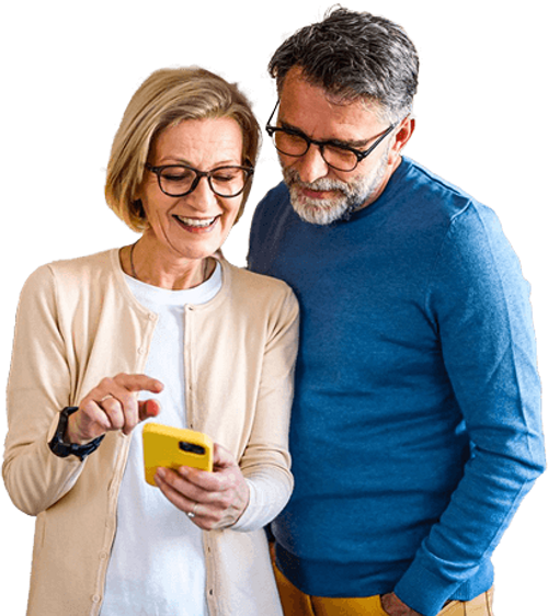 Couple Smiling Looking Phone