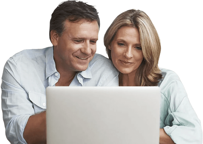 Couple Exploring Medicare Plans Laptop