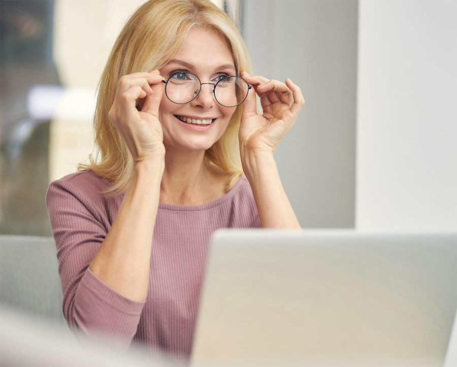 Woman Wearing Glasses at Computer