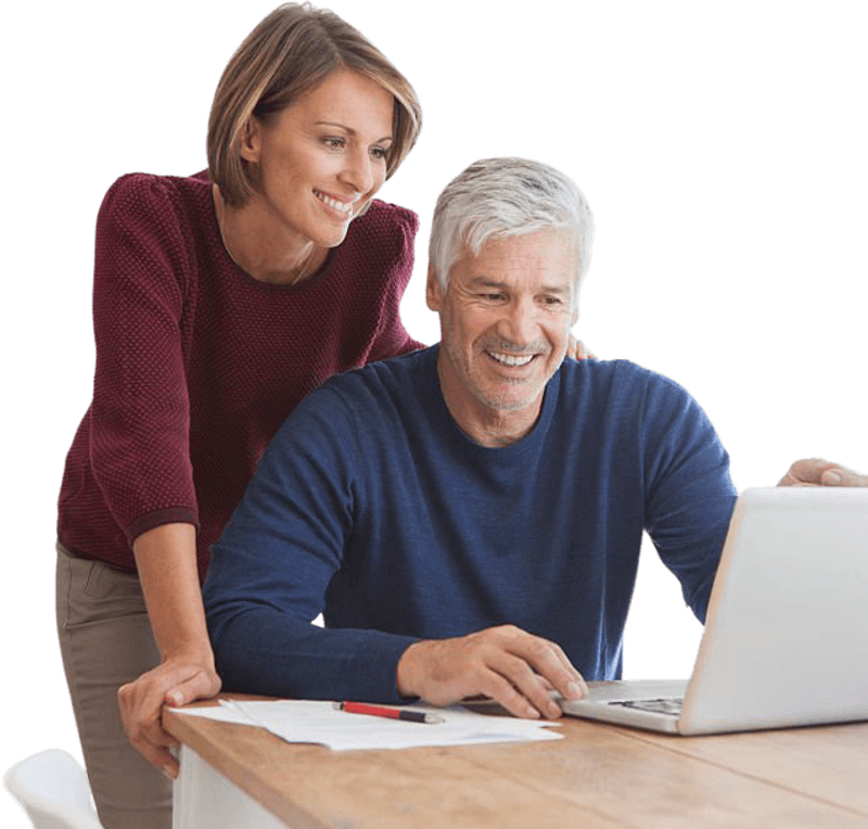 Couple Shopping Medicare Plans Laptop