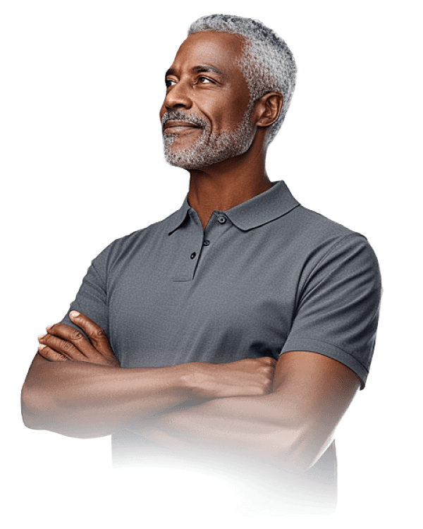 Attractive senior man in grey polo shirt with arms crossed, looking to the right smiling.