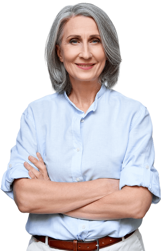 Mature woman standing with arms crossed, smiling.