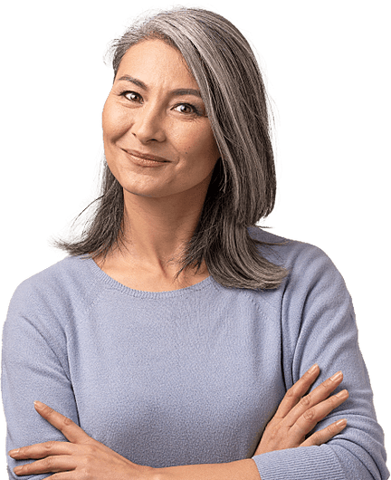 Professional woman in grey sweater smiling.